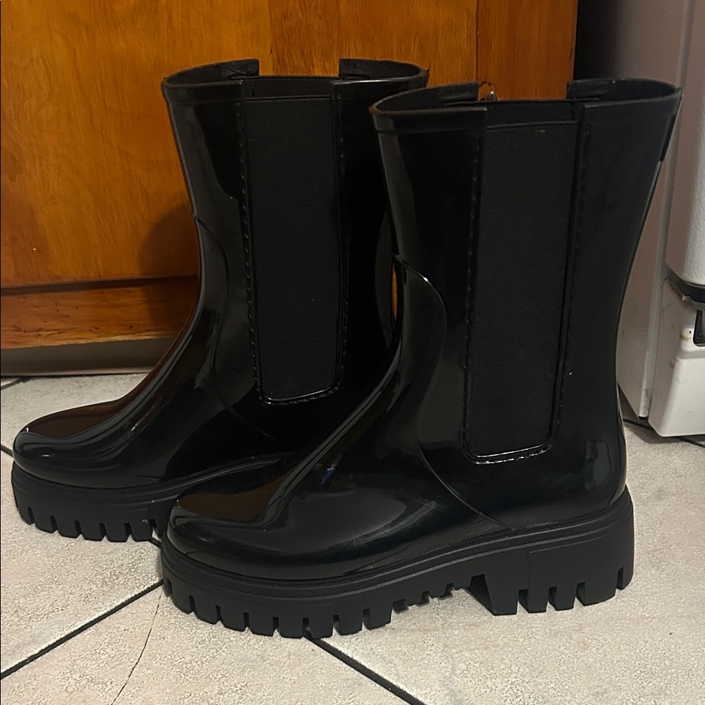 Sleek Black Women's rain boots / combat Boots